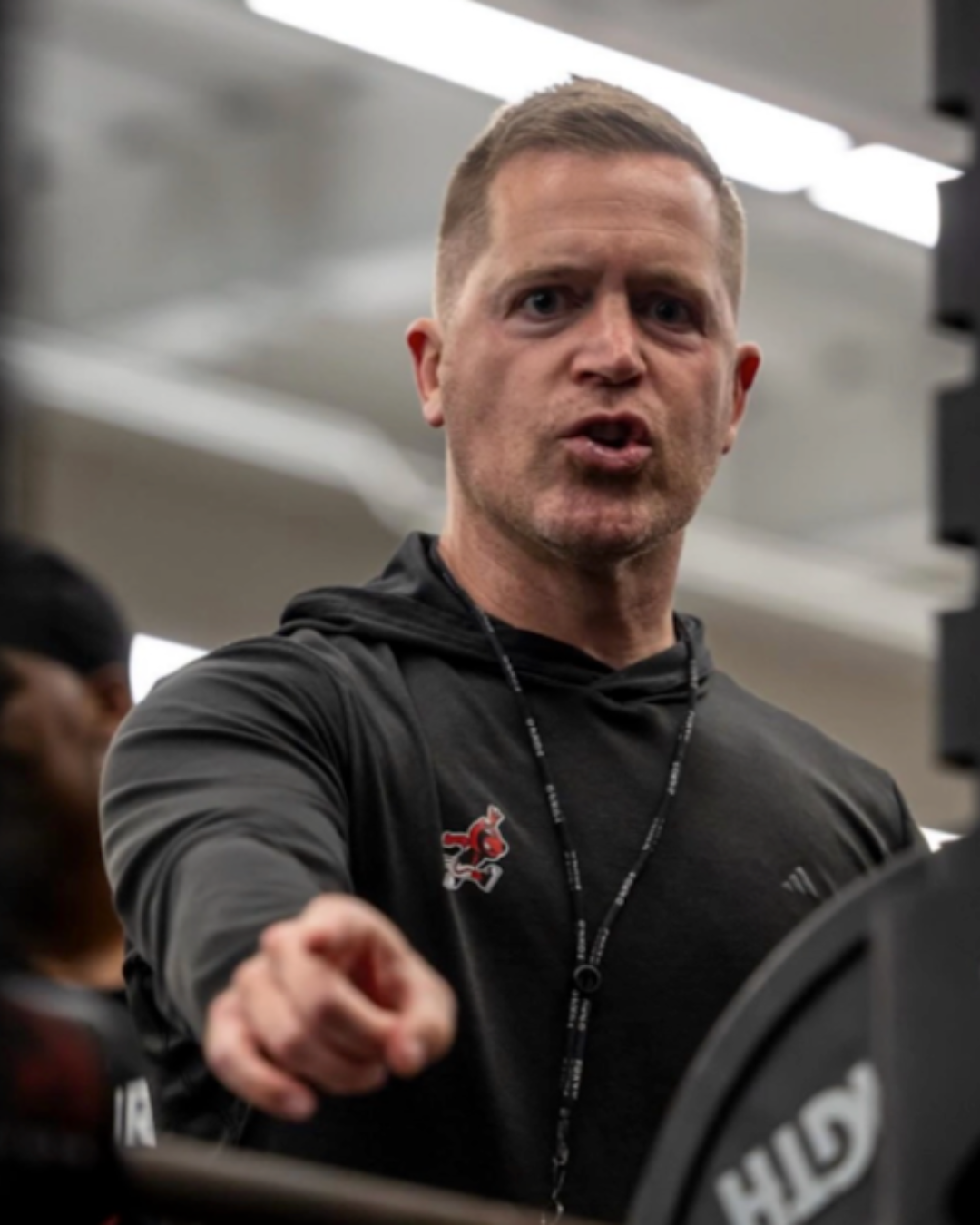 Jeff Jones coaching in the weight room